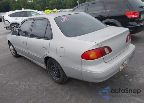 1999 Toyota Corolla Ce from USA, damaged, VIN 1NXBR12E8XZ244085